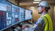 © Instrudify - Alarms illuminate control room, technician focused on urgent red indicators.