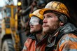 © S photographer - Close-up of two focused workers in helmets, displaying teamwork and concentration in a dynamic industrial setting.