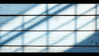 Wall Mural - Wooden planks with horizontal lines and shadows suggest a fence in a natural outdoor setting.