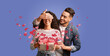 © Prostock-studio - A middle eastern couple celebrates their love on Valentine's Day, with one partner covering the other's eyes playfully while holding a gift