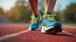 © Alex Pios - pair of running shoes on a track