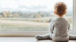 © terat - toddler by window, autumn landscape view - authentic lifestyle phot.