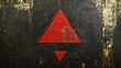 © Raffaza - Red triangle symbol on grunge dark background.