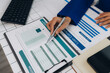 © Imagestoyou - Businessman financial accounting and business cost planning, accountant reviewing company accounting documents, accounting and finance preparation, auditing concept and cost.