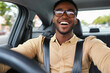 © Rachel - Happy Man Driving Car, Smiling, Beige Shirt, Glasses