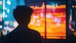 © Ari - A person staring at a digital screen showing the end of the stock market,