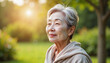 © ON - Studio - Older woman enjoying a peaceful moment in a sunlit garden during late afternoon