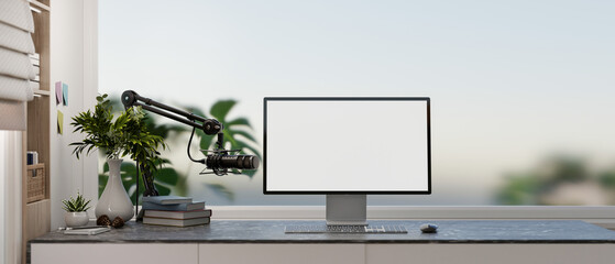 Wall Mural - a modern, simple office workspace featuring a computer with a white desktop mockup and a microphone.