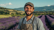 © Atmospheric stock - Smiling caucasian male farmer in lavender field on a sunny day