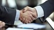 © Evodigger - Two man shaking hands to celebrate the deal in officea,business concept.