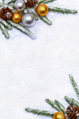 Wall Mural - christmas decoration. christmas yellow golden and silver balls, cone pine and christmas tree in snow