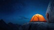 © Sergey - A climbers' tent perched on a narrow mountain ledge under a starry sky