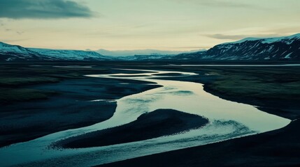 Wall Mural - Serpentine River Flows Through Snowy Mountains Landscape