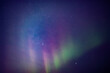 © astrosystem - Aurora borealis, polar lights with Milky Way stars.