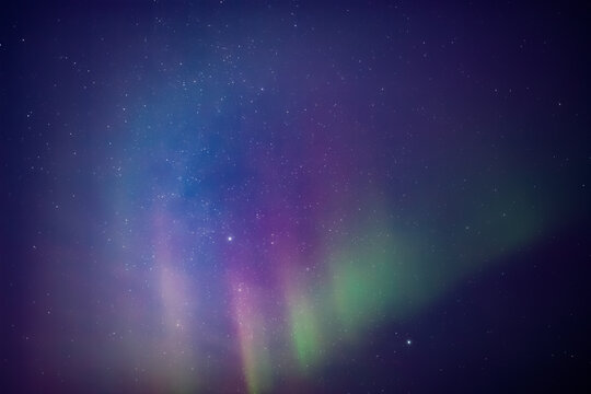 aurora borealis, polar lights with milky way stars.