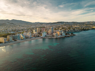 Wall Mural - Spectacular coastline of Calpe at sunset. Beautiful panoramic view of all region. Luxury urbanisations and Hotels. Famous travel destination in Alicante, Costa Blanca, Spain. Sunset point.