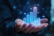 © Pixels Hunter - Businessman's hands holding holographic bar graphs with percentage signs in a futuristic concept.