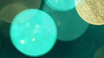 Wall Mural - Captivating Teal and Gold Bokeh Backdrops in Slow Motion