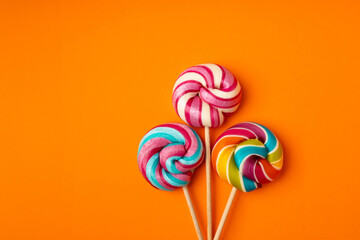 Color lollipop, spiral candy on stick, colorful striped lollypop, round fruit caramel, circle lollipop