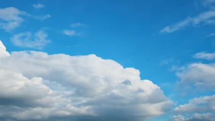 Wall Mural - Beautiful blue sky with clouds on bright sunny day for abstract background. White clouds moving towards the horizon.