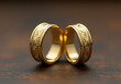 © Galeno - cutting two golden wedding rings reveals intricate design details underneath polished intact original
