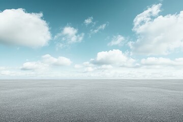 Empty asphalt road under a bright blue sky with fluffy white clouds. (16)