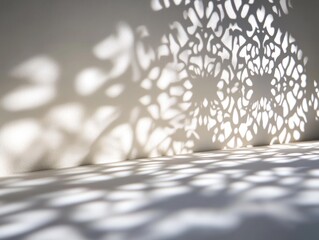 Aufkleber - Intricate shadows cast on a wall, creating a delicate, artistic pattern.