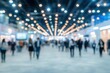© shafiyyah - Blurred view of bustling convention center.