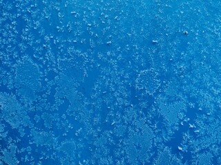 Poster - A blue background with frosty spots
