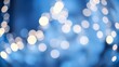 © Chalermrach - Blue glitter vintage lights create a soft, dreamy background, defocused for a magical touch, vintage, festive