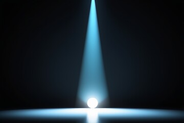Wall Mural - a spotlight on a stage with a light coming from it