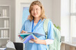 © Pixel-Shot - Female medical student writing in copybook at university
