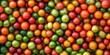 © StockKing - Vibrant small colorful tomatoes create a delightful background and texture, showcasing the unique shades and variety of small colorful tomatoes for your creative projects.