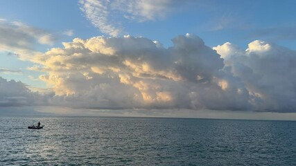 Wall Mural - Motor boat rushing through sea water against stormy cloudy sky.