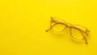 © heinng - Amber Glasses Mockup: Vibrant Yellow Background Photo. AI Generated