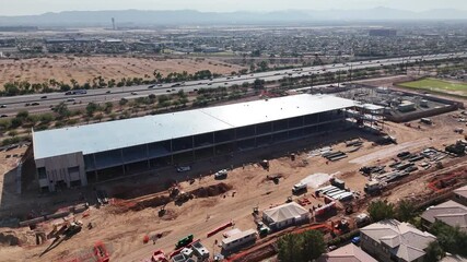 Wall Mural - Drone footage over the QTS Data Center under construction in downtown Phoenix in Nvidia, Arizona