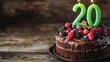 © Pannin - A rustic chocolate cake topped with fresh berries and a glowing green number 20 candle, perfect for a milestone celebration.