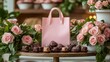 © coroze - Charming Wooden Table Setup with Pink Bags, Roses, and Delicious Treats in a Cozy Environment