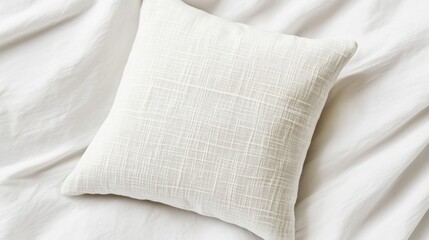 Wall Mural - A pillow photographed from above on a white surface, with clear, sharp details.