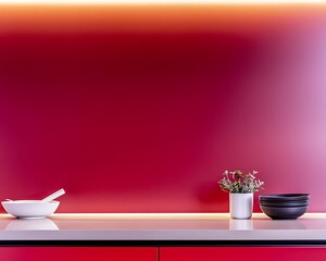 Wall Mural - Modern kitchen counter with red wall, bowls, and plant.