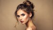 © engincan - Close-up portrait of young beautiful woman with tied hair after morning beauty routine looking leftwards, shoulder turned to camera, isolated on beige background