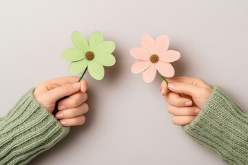 Aufkleber - A simple, clean illustration of two hands holding a delicate flower, drawn in soft pastel tones on a white background