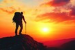 © wiwat apisithpinyo - Hiker Silhouetted Against Sunset Mountain Landscape