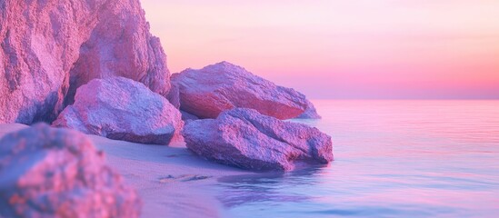 Wall Mural - Tranquil shoreline featuring pink-hued rocks under a pastel sunset sky with calm waters reflecting serene colors of twilight.