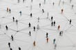 © Kavidu - Large Group of Connected People Shapes Representing Unity, Collaboration, and Digital Networking with Abstract Simplicity