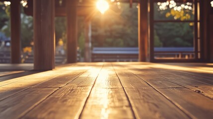 Canvas Print - Empty wooden table with sunlight shining through blurred background creating a tranquil atmosphere in a serene setting