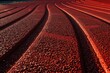 © Vlad - Abstract Red Racetrack Texture: Dynamic Athletic Background for Championship Competition