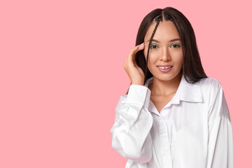 Wall Mural - Beautiful young Asian woman with stylish mint makeup on pink background