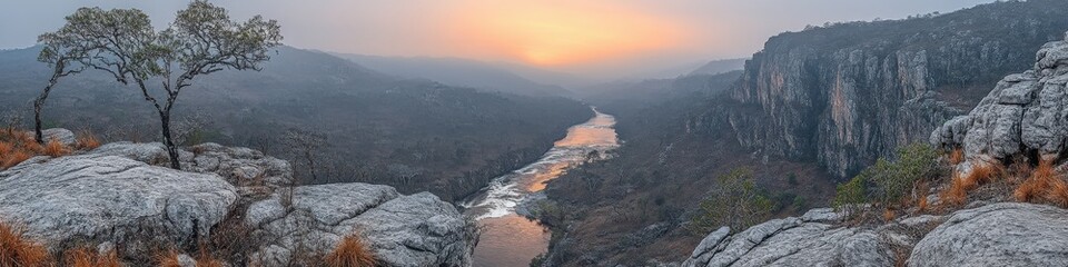 Canvas Print - Spectacular Sunset Over Majestic Gorge with River View, Rocky Cliffs, Lush Forest, and Dramatic Sky - Captivating Landscape Horizon and Nature Scene