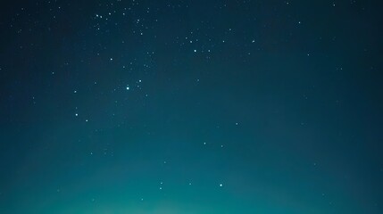 Wall Mural - dark teal night sky with scattered stars.